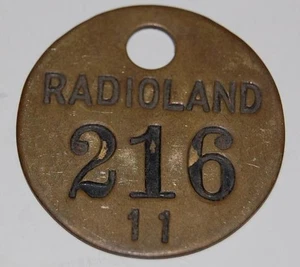 RARE VINTAGE RADIOLAND #216 BRASS ADVERTISING TAG MEDAL KEY CHAIN MOVIE ID TAG - Picture 1 of 3