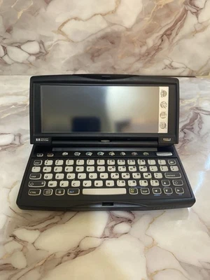 PC portátil Hewlett Packard HP 620LX Palmtop Microsoft Windows CE Foto 1 de 4