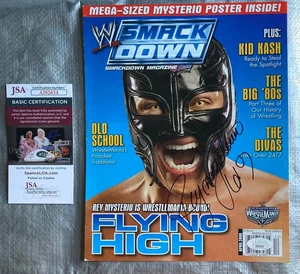 REY MYSTERIO SIGNED WWE MAGAZINE COVER JSA AUTHENTICATED AI92654 - Picture 1 of 1