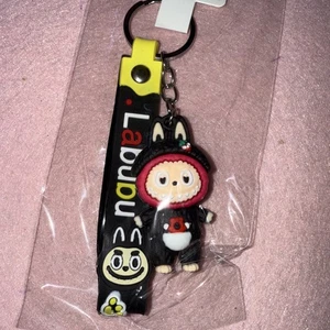 Little Monsters Black Keychain, Or Bag Charm w/ Silicone Strap NWOT - Picture 1 of 5
