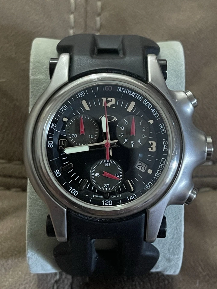 Reloj Oakley Holeshot esfera negra caja de acero inoxidable cronógrafo movimiento suizo Foto 1 de 4