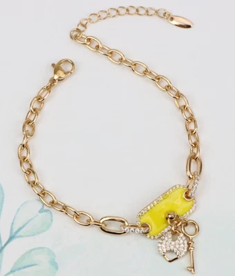 Pulsera Oro Rosa con Dije Amarillo y Cerradura y Llave de Cristal, XPBL0890 Foto 1 de 4