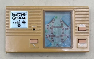 RARO JUEGO ELECTRÓNICO PORTÁTIL GUTTANG GOTTNG MATTEL 1982 LCD (MVP032010) - Imagen 1 de 5