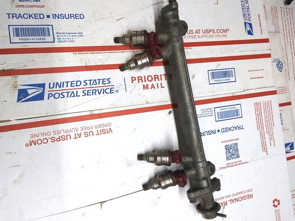 Juego de inyectores de riel de combustible Mitsubishi Expo 4G64 buen estado ohmios comprobar bien Foto 1 de 4