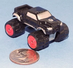 Small Hot Wheels Monster Truck Pickup truck Pickup truck in Black/Skull & Cross - Picture 1 of 3