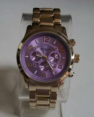 Reloj de pulsera informal elegante con esfera púrpura con acabado dorado para mujer Foto 1 de 4