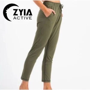 Pantaloni da pista Zyia verde attivo conico donna piccolo nylon spandex due tasche - Foto 1 di 7