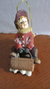 BOY ON SLED CHILD SLEDDING Christmas ORNAMENT - Picture 1 of 2