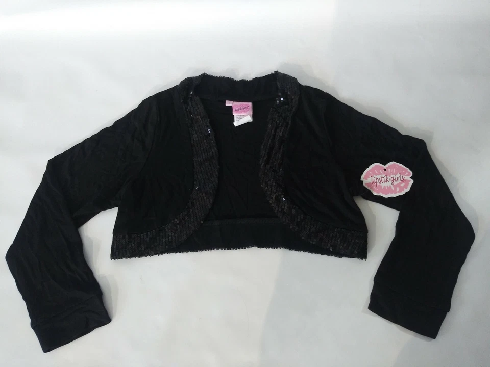 Nuevo Niñas Negro Con Lentejuelas Ribete Encogerse de hombros Manga Larga Disponible en Tallas 4 y 6-10 Foto 1 de 1