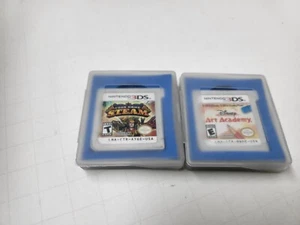 2 Games ART ACADEMY & CODE NAME S.T.E.A.M Game cartridges W/Blue Pad Cases #J14 - Picture 1 of 5