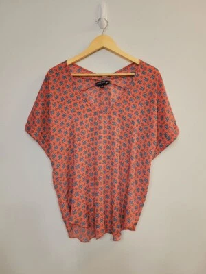 Blusa geométrica Living Doll naranja pastel talla mediana Foto 1 de 4