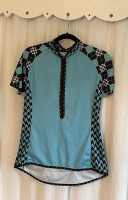 Camiseta deportiva de ciclismo SheBeest para mujer XL media cremallera azul negro pata de gallo LEER Foto 1 de 4