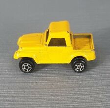 Vintage Tootsie Toy Yellow Dump Truck 2" Chicago, Illinois USA