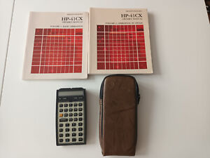 Calculatrice HP-41CX avec étui + 2 superpositions + manuels 1 et 2