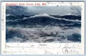 1908 POSTAL ANTIGUA SALUDOS DESDE OCEAN CITY MD BREAKING WAVES FRANZ HULD - Imagen 1 de 2