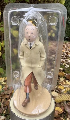 Figurine Tintin en trench-coat – Le Crabe aux Pinces d’Or – Édition Moulinsart - Photo 1/4