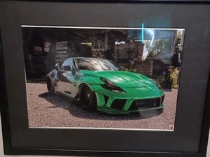 Green sports car framed print - Bild 1 von 1