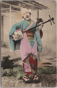 Vintage 1910s JAPAN Postcard Young Woman in Colorful Kimono, Playing Samisen - Picture 1 of 2