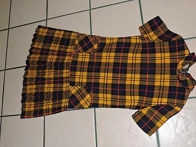 De colección. CASERO TEJIDO A CUADROS POLIÉSTER SHRT SLV BOLSILLOS PLISADOS CUELLO REDONDO S/M Foto 1 de 4