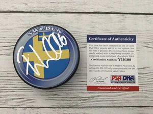 Elias Lindholm Signed Autographed Team Sweden Hockey Puck PSA DNA COA Flames a - Picture 1 of 3