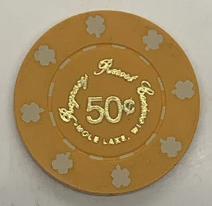 Ficha de casino Regency Resort Casino Mole Lake Wisconsin $0,50 - Molde de trébol naranja - Imagen 1 de 4