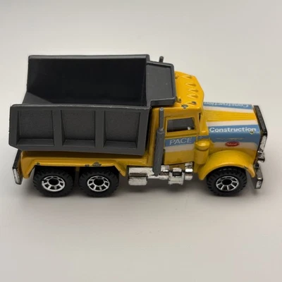 Matchbox Peterbilt 1981 Diecast Yellow Pace Construction Dump Truck - Image 1 of 4