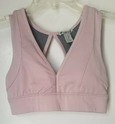 Sujetador deportivo Forever 21 rosa rubor para mujer con recortes talla XS Foto 1 de 3