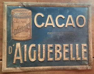 Ancienne Plaque Tole lithographiée embossée CACAO D AIGUEBELLE cafe bar  42x32cm - Imagen 1 de 7