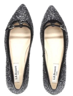 L.K. Pisos Bennett plateados con brillo en punta talla 37. Nunca usado perfecto estado Foto 1 de 4