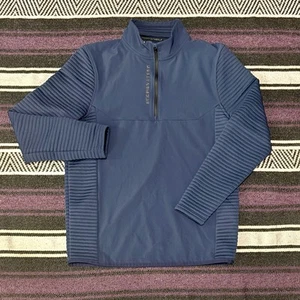 Chaqueta de golf Under Armour con un cuarto de cremallera pequeña azul marino - Imagen 1 de 8