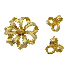 Conjunto de joyería ART clásico con lazo de cinta dorada broche y pendiente con clip - Imagen 1 de 5