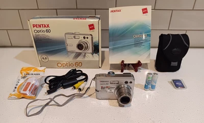 Pentax Optio 60 6MP 3x Zoom Digital Camera Bundle + New Batteries, Memory & Accs - Image 1 of 4