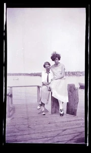 LATE 1800s/EARLY 1900s FILM NEGATIVE, MAINE COAST, TWO LADIES ON A DOCK, HAIR??? - Picture 1 of 1