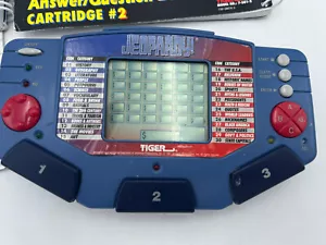 Tiger Electronics Jeopardy Game 1995 / 4 Cartridges + Answer/Question Books EUC - Picture 1 of 7