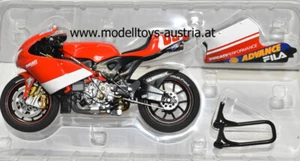 Ducati Desmosedici 2003 Loris CAPIROSSI 1.GP Sieg MOTO GP DIRTY VERSION 1:12 - Imagen 1 de 11