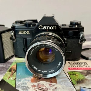 Canon AE-1 SLR 35mm Film Camera Black w/ Canon Lens FD 50mm F1.8 + Canon Strobe! - Picture 1 of 24