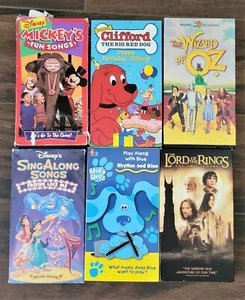 VHS LOT Wizard of OZ, CLIFFORD, Blues CLUES, Disney Fun Sing Along, Lord of RING - Picture 1 of 3