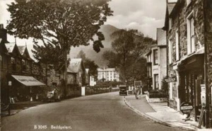 REAL PHOTO POSTCARD OF THE SQUARE, BEDDGELERT CAERNARFONSHIRE, WALES BY SALMON - Picture 1 of 2
