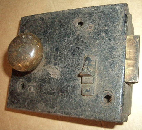 Antique/vintage door latch rim lock with sliding brass knob Cover
