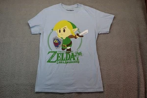 Legend of Zelda Links Awakening Camiseta Pequeña Azul Nintendo Producto Oficial - Imagen 1 de 6