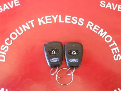 PAIR- FORD   KEYLESS REMOTE ELVATJH  1-BUTTON  RED LIGHT VERY GOOD CONDITION - Image 1 of 2