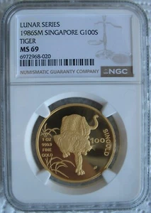 Singapore 1986 1oz Gold 100 Singold NGC MS-69 Tiger - Picture 1 of 3