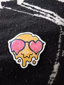 Trippy Melting Cartoon Face With Heart Shaped Eyes Sticker - Picture 1 of 5