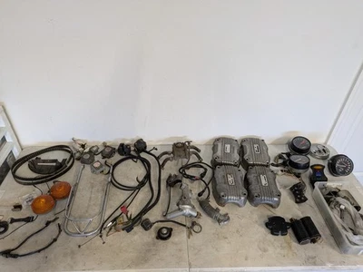 Lote de piezas Goldwing años 70 80 Honda GL 1000 1100 1200 cubiertas calibre motor fabricante original Foto 1 de 4