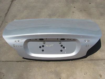 TAPA MALETERO JAGUAR TIPO X PLATEADA 2001 2002 2003 2004 2005 2006 Foto 1 de 4