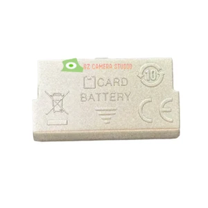 Nueva cubierta de batería Nikon S550 gris plata cámara repuestos - Imagen 1 de 1