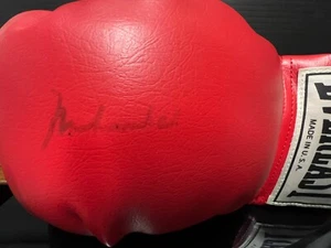 GUANTES FIRMADOS POR MUHAMMAD ALI Y GEORGE CAPATAZ CON CERTIFICADO DE AUTENTICIDAD Y EXHIBICIÓN - Imagen 1 de 11