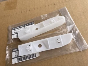 NISSAN SKYLINE R34 GTT S1 2/4door front bumper bar side bracket plastic pair new - Picture 1 of 2