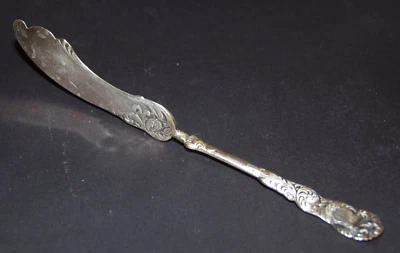 Waldo HE - CUCHILLO MANTEQUILLA MANGO TORCIDO RIALTO - Holmes & Edwards 1894 - Placa astillada Foto 1 de 4