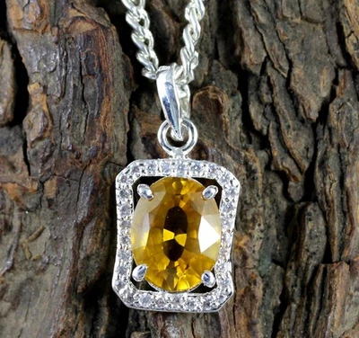 Colgante certificado piedras preciosas ovaladas naturales de Ceilán de zafiro amarillo de 11,95 quilates/13 mm Foto 1 de 4